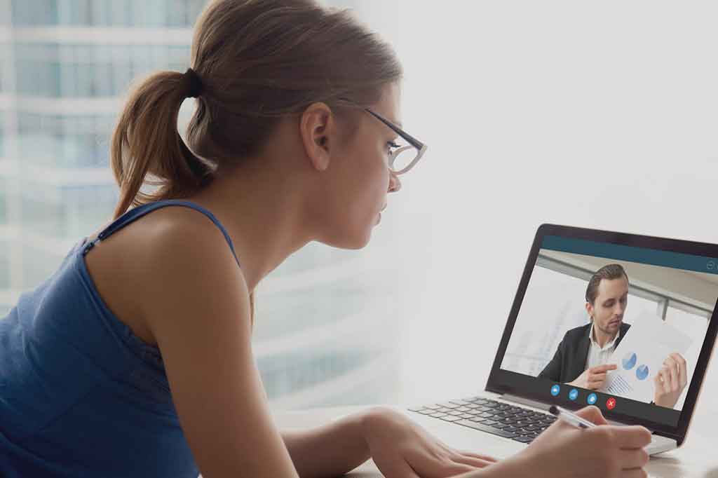 Lady learning via video conference call