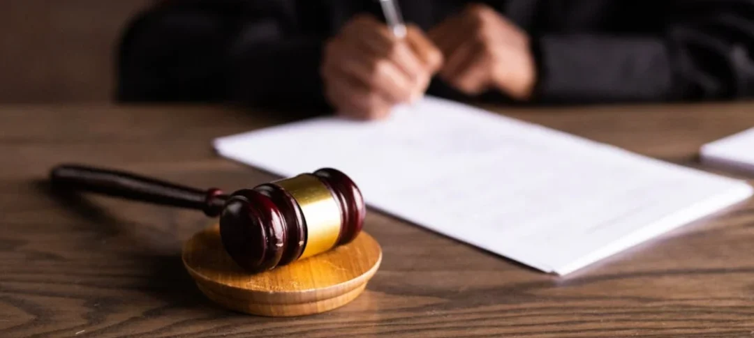 Judge with paperwork and gavel